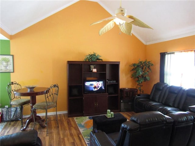 274 Griffith St, Winder, GA 30680 - living area with lofted ceiling, wood finished floors, a ceiling fan, crown molding, and baseboards