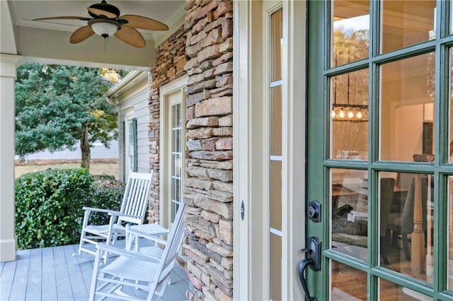 exterior space featuring ceiling fan and covered porch