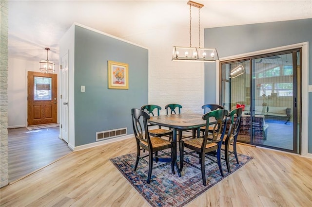 1019 Whippoorwill Rd, Monticello, GA 31064 - dining area featuring a chandelier and wood finished floors
