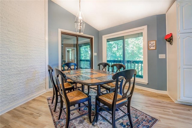 1019 Whippoorwill Rd, Monticello, GA 31064 - dining room with light wood-style flooring and lofted ceiling