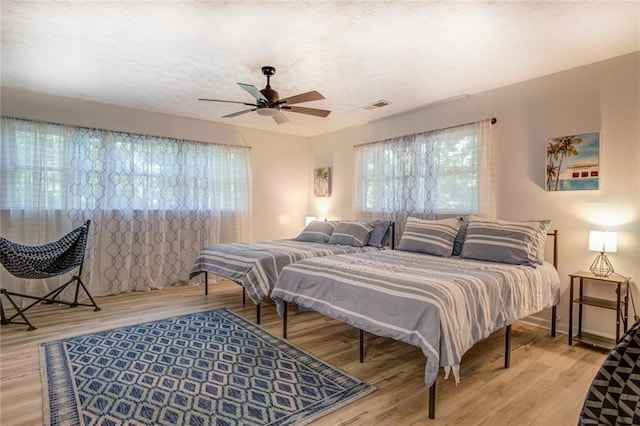 1019 Whippoorwill Rd, Monticello, GA 31064 - bedroom with light wood-style floors and a ceiling fan