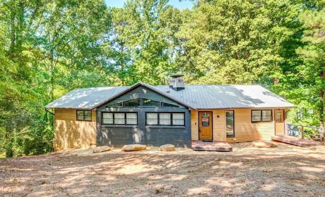 1019 Whippoorwill Rd, Monticello, GA 31064 - chalet / cabin featuring a chimney and a metal roof