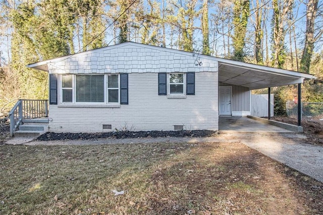 view of front of house featuring a carport