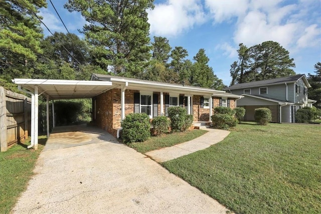 view of front facade featuring a carport, a porch, and a front yard