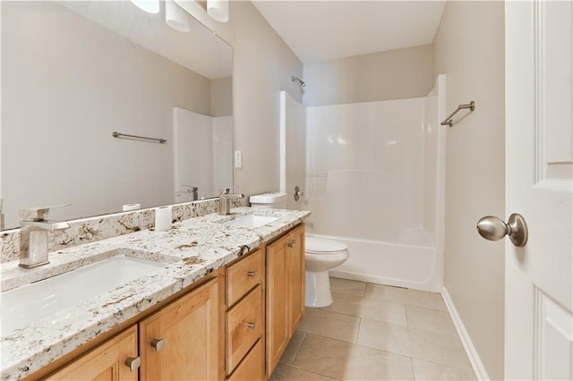 full bathroom with vanity, tile patterned floors, toilet, and bathtub / shower combination