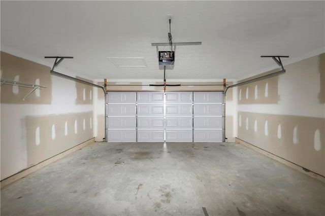 garage featuring a garage door opener