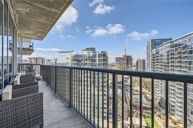 balcony featuring a city view