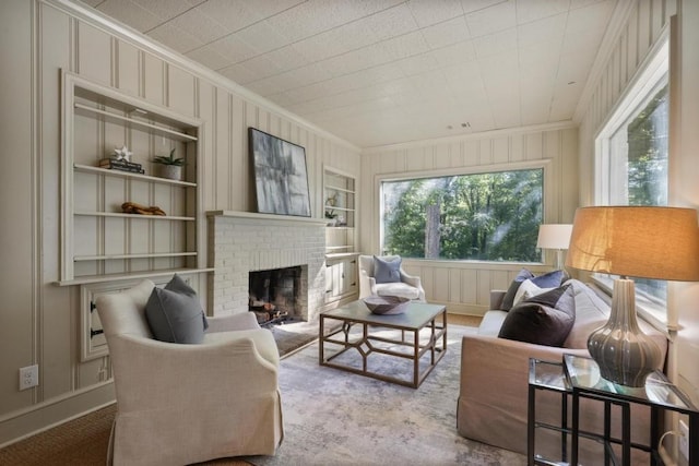 interior space featuring a brick fireplace and plenty of natural light