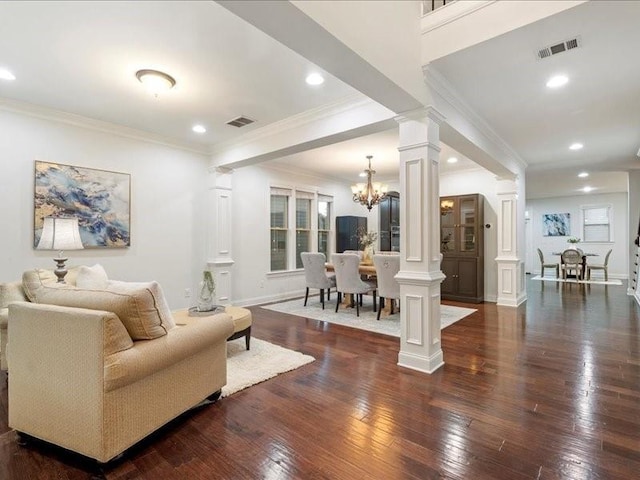 210 Ashland Ct, Alpharetta, GA 30004 - living room featuring ornate columns, dark wood-style flooring, a chandelier, ornamental molding, and recessed lighting