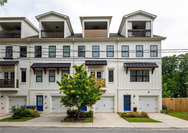 1196 Wylie St SE, Atlanta, GA 30316 - townhome / multi-family property featuring a balcony, a standing seam roof, board and batten siding, and metal roof
