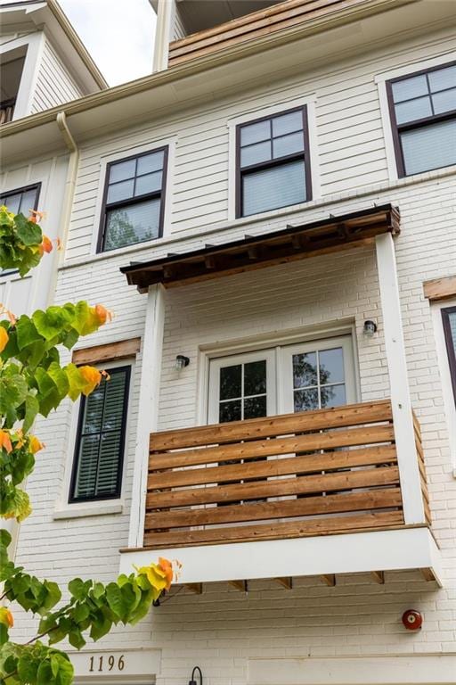 1196 Wylie St SE, Atlanta, GA 30316 - doorway to property with a balcony and brick siding