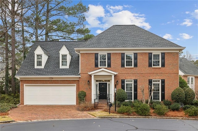 colonial-style house with a garage