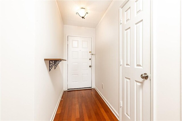 2901 Lenox Way NE Unit 902, Atlanta, GA 30324 - entryway with baseboards and dark wood-type flooring