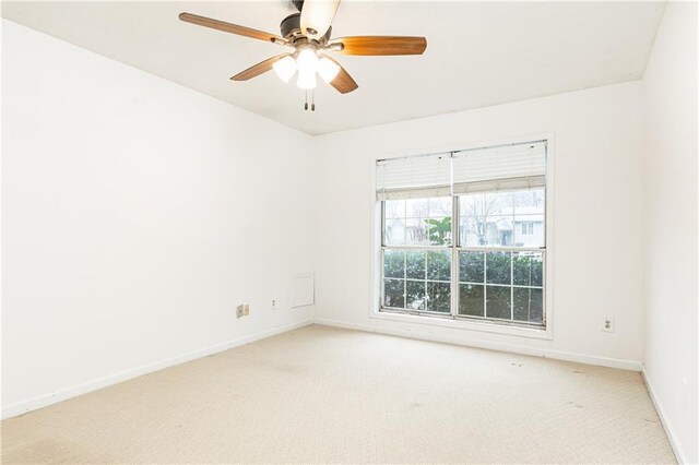 2901 Lenox Way NE Unit 902, Atlanta, GA 30324 - empty room with light carpet, baseboards, and ceiling fan