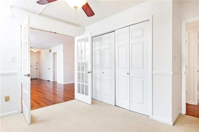 2901 Lenox Way NE Unit 902, Atlanta, GA 30324 - unfurnished bedroom featuring carpet, french doors, a closet, ceiling fan, and baseboards