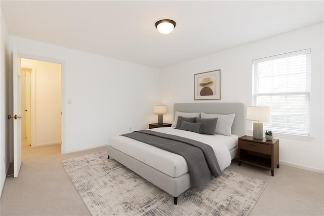 2901 Lenox Way NE Unit 902, Atlanta, GA 30324 - bedroom featuring light carpet and baseboards