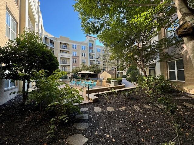 view of property's community with a pool