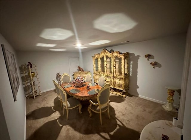 view of carpeted dining room