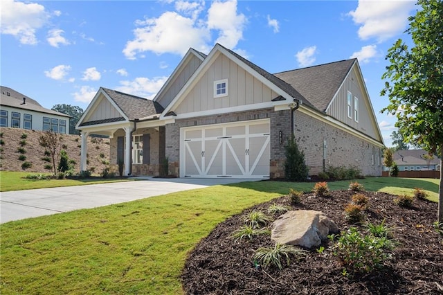 craftsman-style house featuring a front lawn and a garage