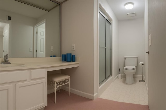 full bath with vanity, toilet, baseboards, a shower stall, and visible vents