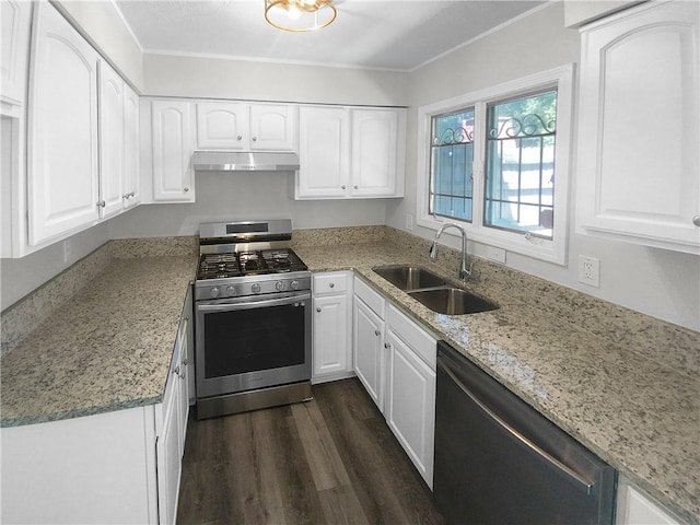 kitchen with light stone counters, stainless steel appliances, dark hardwood / wood-style flooring, and sink