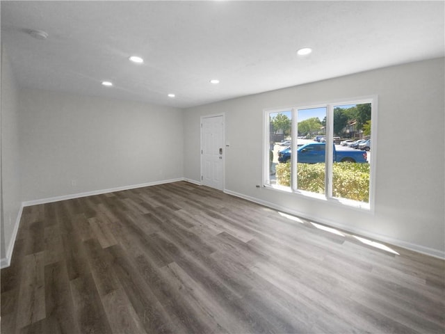 empty room featuring dark hardwood / wood-style floors