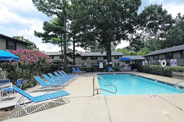 view of pool with a patio