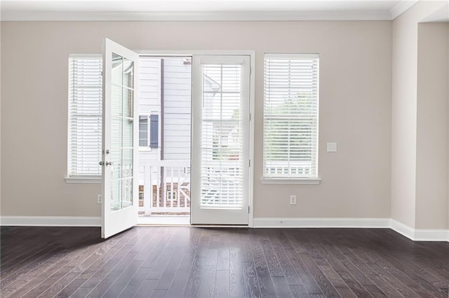 164 Blakemore Dr, Smyrna, GA 30080 - unfurnished room with dark wood-style flooring, healthy amount of natural light, and crown molding