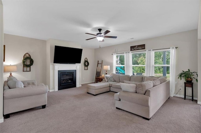 7 Wilmer Way, Cartersville, GA 30120 - carpeted living room with ceiling fan and a glass covered fireplace