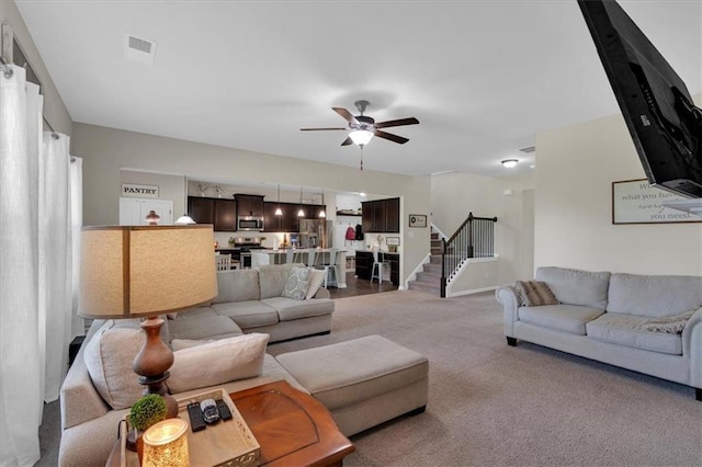 7 Wilmer Way, Cartersville, GA 30120 - carpeted living area featuring stairway and ceiling fan