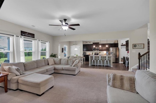 7 Wilmer Way, Cartersville, GA 30120 - carpeted living area featuring ceiling fan and stairs