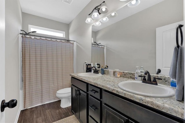 7 Wilmer Way, Cartersville, GA 30120 - full bath featuring shower / bath combination with curtain, double vanity, and wood finished floors
