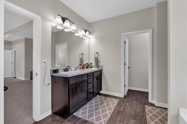 7 Wilmer Way, Cartersville, GA 30120 - bathroom with double vanity and wood finished floors