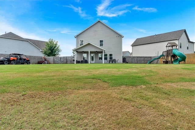 7 Wilmer Way, Cartersville, GA 30120 - back of house with a playground and a fenced backyard