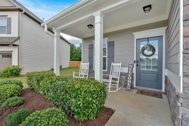7 Wilmer Way, Cartersville, GA 30120 - doorway to property featuring covered porch and stone siding