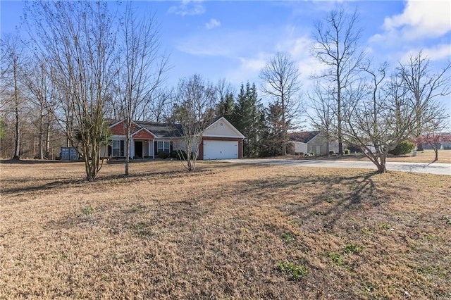 ranch-style house featuring a garage