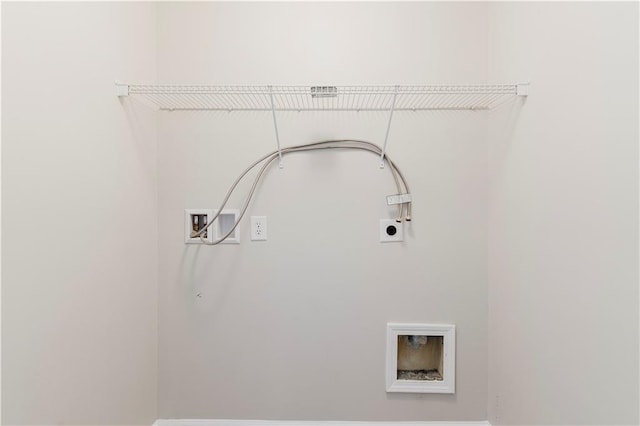 clothes washing area with hookup for an electric dryer and hookup for a washing machine
