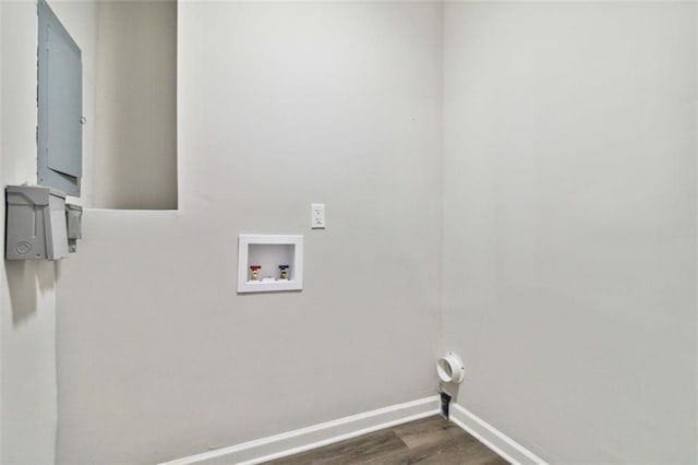 laundry area featuring laundry area, hookup for a washing machine, baseboards, and dark wood-type flooring