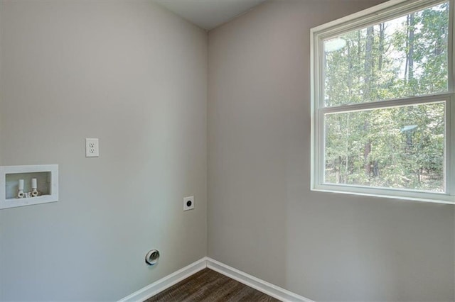 laundry area featuring washer hookup, dark hardwood / wood-style flooring, hookup for an electric dryer, and plenty of natural light