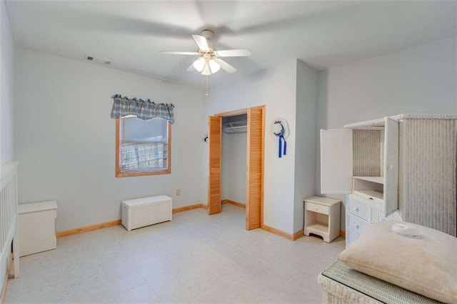 bedroom featuring ceiling fan and a closet