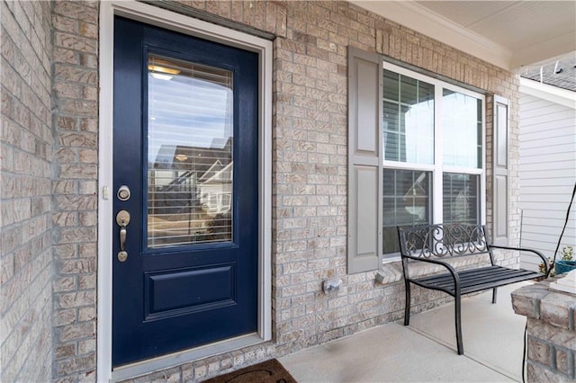 property entrance with a porch