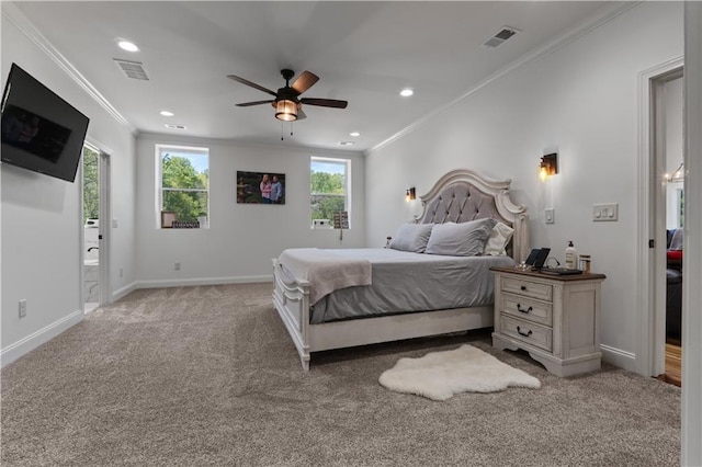 carpeted bedroom with ceiling fan, crown molding, and multiple windows