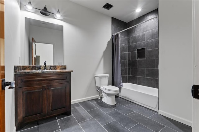 full bathroom with shower / bath combo with shower curtain, vanity, and toilet