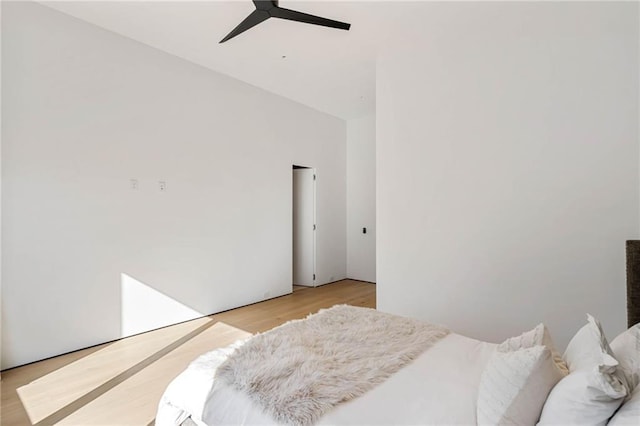 bedroom featuring ceiling fan and light wood-style flooring