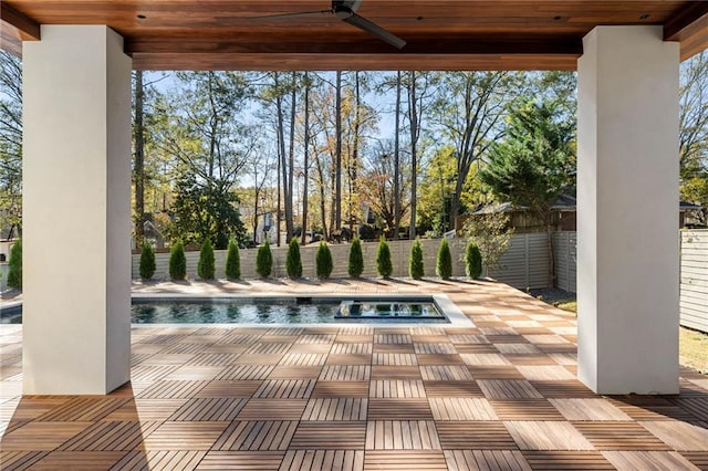 view of swimming pool with a fenced backyard, a fenced in pool, a ceiling fan, and a patio