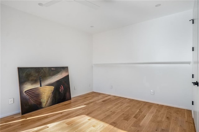 spare room featuring hardwood / wood-style floors