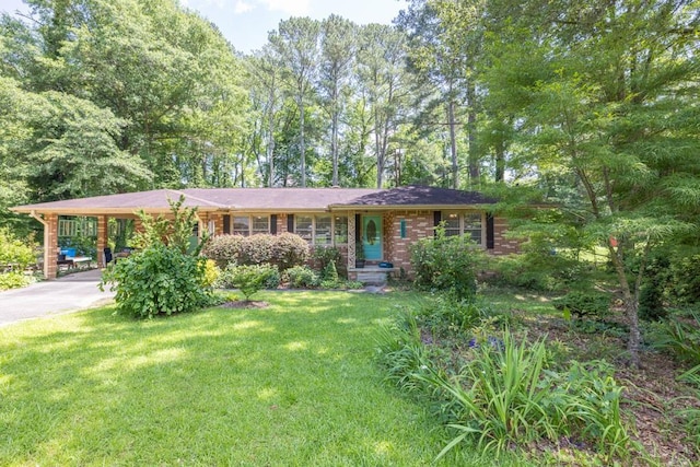 5400 Francis Ave, Stone Mountain, GA 30087 - ranch-style house featuring driveway, an attached carport, and a front lawn