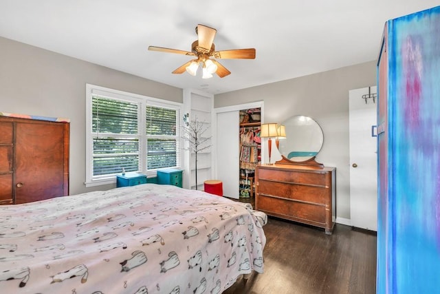 5400 Francis Ave, Stone Mountain, GA 30087 - bedroom featuring wood finished floors, a ceiling fan, baseboards, and a closet