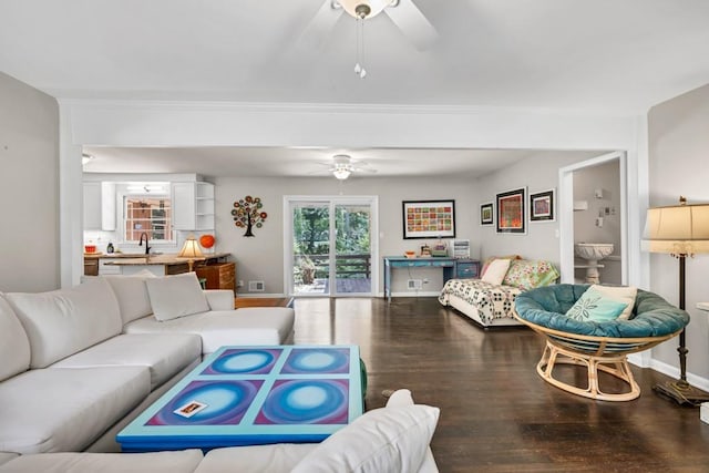 5400 Francis Ave, Stone Mountain, GA 30087 - living room with ceiling fan, wood finished floors, plenty of natural light, and baseboards
