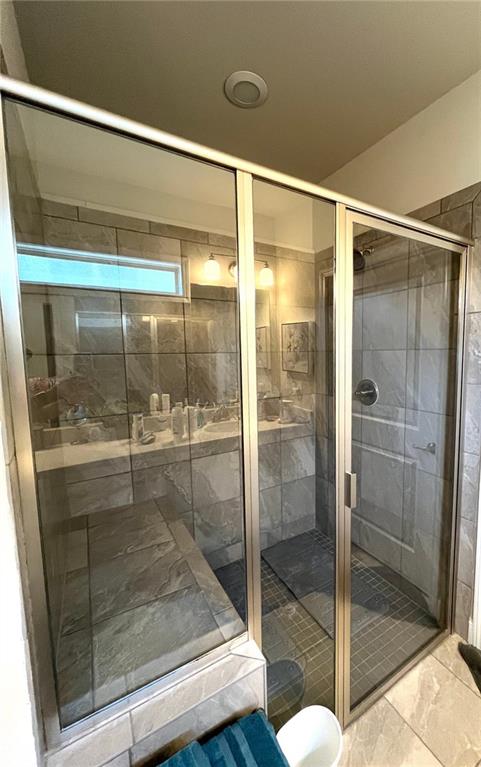 bathroom with walk in shower